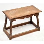 A 19th century oak joint table raised on stretchered block supports, height 44cm, length 67cm, depth