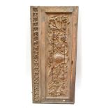 A large late 19th century foliate carved wooden rectangular panel with stylised device to centre,