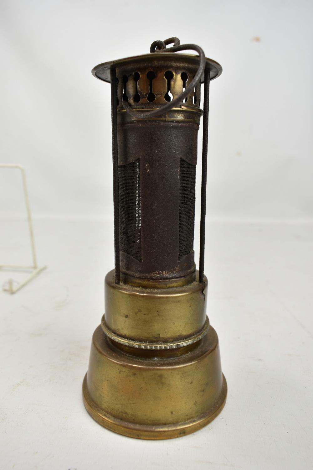 An early to mid 20th century brass safety heater with hook, height 22cm.Additional - Image 3 of 5