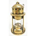 A very rare J. Rayner's Patent miner's brass flame safety lamp with stamped marks and loop handle,
