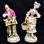 A pair of late 19th century German hard paste porcelain figurines, one in the form of a huntsman and