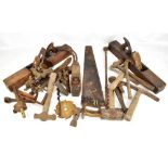 A collection of vintage tools including planes, saw, clamps, hammers etc.Additional