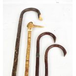 Four walking sticks including a shepherd's crook, length 123cm (4).Additional InformationGeneral