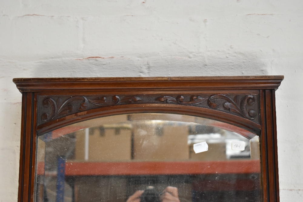 A late 19th/early 20th century rectangular mahogany wall mirror with foliate carved frieze and - Image 2 of 2