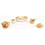 ROYAL WORCESTER; a hand painted miniature jug painted with fruit, indistinctly signed to rim,