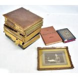 Three Victorian photograph albums containing numerous family photographs, a gilt framed print, etc.