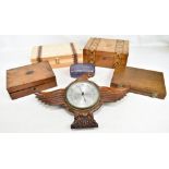 An early/mid-20th century barometer set in carved wooden case modelled as an eagle, with silvered