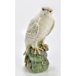 ROYAL COPENHAGEN; a model of an Icelandic falcon perching on a rock, height 39cm.Additional