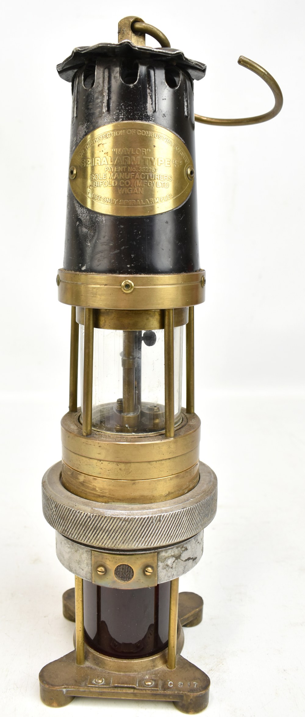 NAYLOR OF WIGAN; an early 20th century 'Spiralarm' miner's safety lamp with aluminium bonnet,