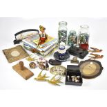 A mixed lot of assorted collectibles to include three glass jars containing glass and ceramic