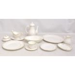 ROYAL WORCESTER; a Contessa pattern dinner service, to include teapot, bread plates, twin handled