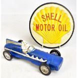 A reproduction cast iron advertising Michelin Car, length 25.5cm, and a similar Shell Motor Oil