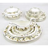 WEDGWOOD; a floral decorated part dinner service, twenty-four pieces.Additional InformationWear to
