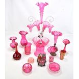 A collection of Victorian and later cranberry glassware to include an epergne (two branches