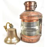 A copper ship's lamp and applied brass plaque 'Nine Hopper' height including swing handle 52cm,