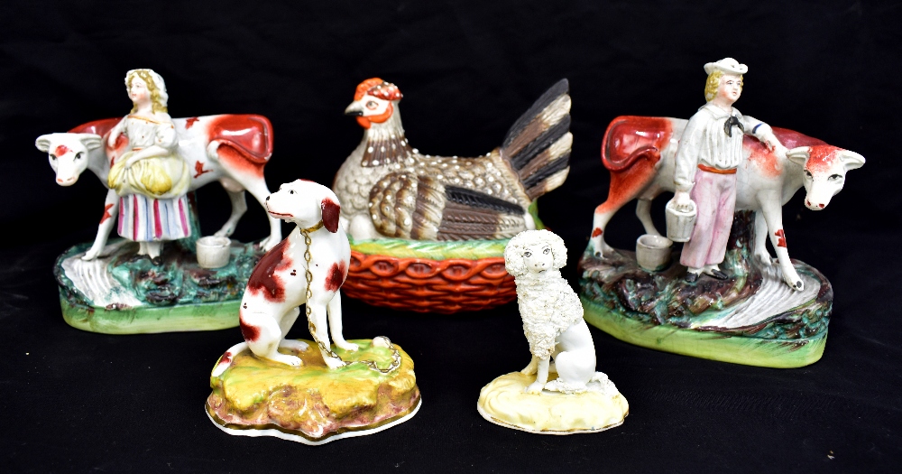 A collection of 19th century and later Staffordshire to include a pair of flat back figures