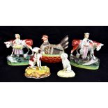 A collection of 19th century and later Staffordshire to include a pair of flat back figures