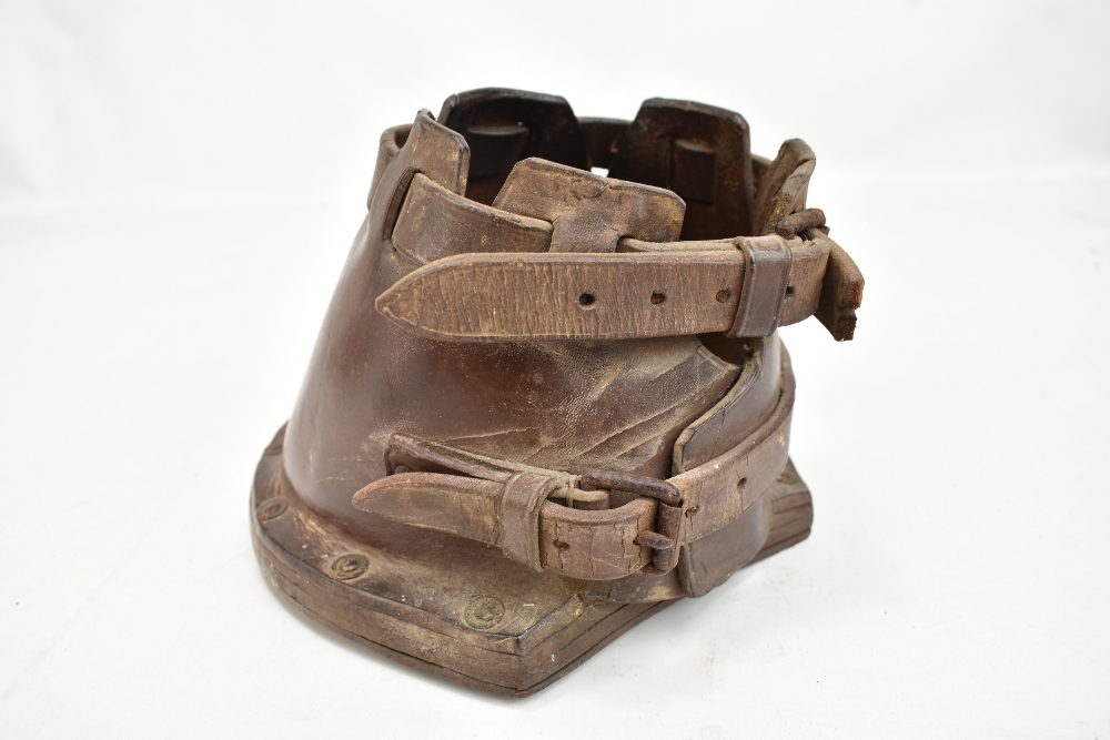 A 19th century horse's leather shoe cover used when mowing cricket pitches, 16 x 20cm.Additional - Image 2 of 6
