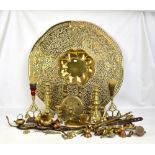 A large 20th century Middle Eastern brass charger with arabesque decoration, unmarked, diameter