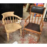 A stripped elm captain’s spindle back armchair with dished seat and an Arts & Crafts oak elbow chair