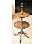 An Edwardian mahogany two tier dumb waiter, height 107cm.Additional InformationGeneral wear, minor