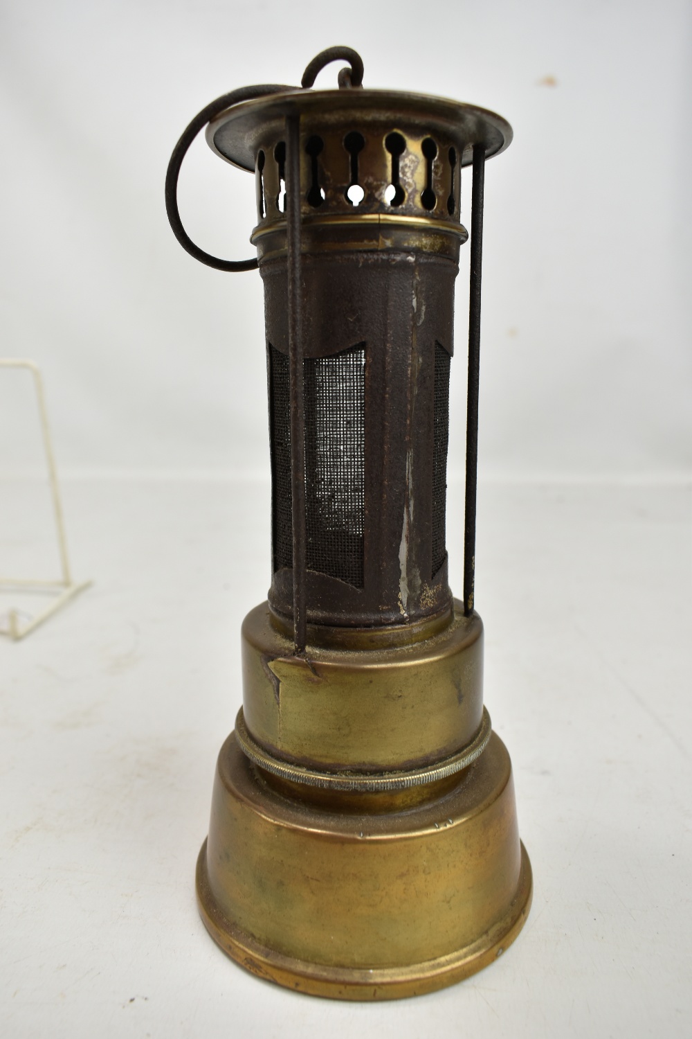 An early to mid 20th century brass safety heater with hook, height 22cm.Additional - Image 4 of 5