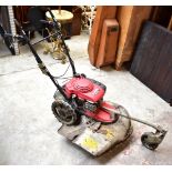 HONDA; a petrol UM536 lawnmower.Additional InformationArea of the bottom plate has corroded and is