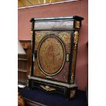 A 19th century French Boulle work pier cabinet, with single panelled door, raised on shaped