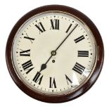 An early to mid 20th century ex-Post Office mahogany cased wall clock, the circular enamelled dial