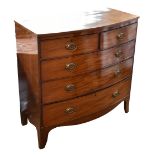 A late 19th century mahogany bow fronted chest of two short over three long drawers with ebony inlay