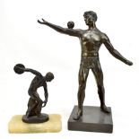 AFTER THE ANTIQUE; an early 20th century bronze figure 'The Discobolus of Myron' raised on an onyx