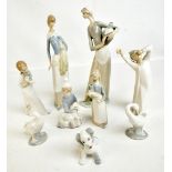 LLADRO; six figures and three further similar, including one Nao (9).Additional