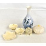 BELLEEK; two lidded pots, one featuring flowers and shells, height 6.7cm, a pair of scallop