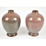 A pair of 20th century Chinese Jun-type ovoid vases with mottled purple glaze, both with impressed