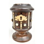 A 19th century turned lignum vitae and bone moneybox, height 11.5cm.Additional Informationhinged lid