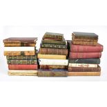 A mixed group of books and decorative bindings including 'The History of the Peloponnesian War of