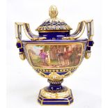 SERVES; a 19th century twin handled pedestal lidded vase painted with two panels, the first
