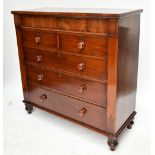 A Victorian mahogany chest of drawers, with secret single drawer to the top above two short and