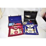 A collection of Masonic regalia including gilt base metal jewels, two aprons, booklets, etc.