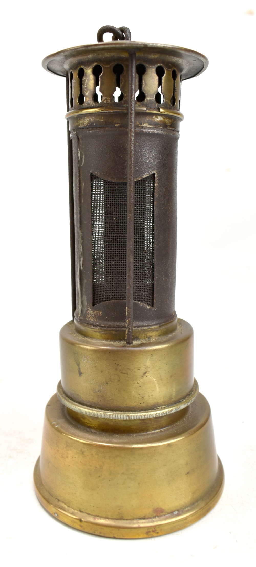 An early to mid 20th century brass safety heater with hook, height 22cm.Additional