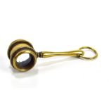 A brass novelty miniature magnifying glass modelled in the form of a gavel, length 7cm.Additional