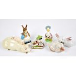 A mixed group of ceramic figures comprising Beswick Beatrix Potter 'Jemima Puddleduck' and 'Mrs