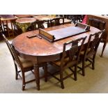 A mahogany wind-out extending dining table with two leaves on reeded supports, 75 x 195 x 107cm, a