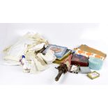 A collection of textiles including 1950's and 60's fabrics, parasol, pair of kid leather gloves,