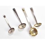 RF & CO; three Arts & Crafts silver plated ladles, length of largest example 16cm, and a silver