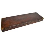 A mahogany and brass bound shot gun case, lacking fitments, 26 x 82cm. Additional InformationNo