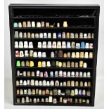 A large collection of white metal, silver plated, ceramic and further thimbles to include Hammersley