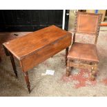 A Victorian mahogany Pembroke table, with single end drawer, raised on column support terminating on