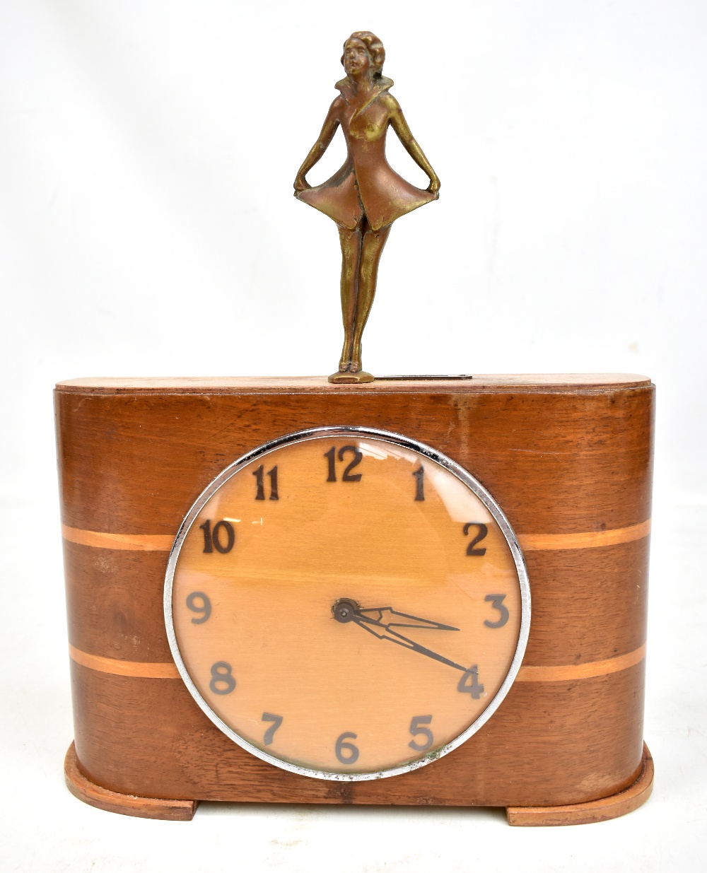 A rare Art Deco combination money box and clock with bronzed figural finial, the circular dial set