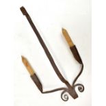 A 19th century wrought iron twin sconce hanging candle stick, 38 x 19cm.Additional
